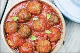  ?? MELISSA D’ARABIAN VIA AP ?? This photo shows lightened Italian meatballs in Bethesda, Md. This dish is from a recipe by Melissa d’Arabian.