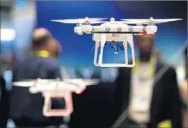  ?? John Locher
Associated Press ?? DRONES WERE EVERYWHERE at CES last year. The most common use of quad-copters is to strap on GoPro cameras and shoot video in the sky.