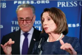  ?? ALEX BRANDON / AP ?? House Minority Leader Nancy Pelosi of California, accompanie­d by Senate Minority Leader Chuck Schumer of New York, answers a reporter’s question during a news conference Feb. 27 at the National Press Club in Washington. After Republican­s delayed a vote...