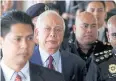  ?? REUTERS ?? Ex-Malaysian premier Najib Razak, second left, is seen in court in July.