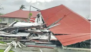  ?? AFP ?? The flattened Parliament House in Tonga's capital of Nuku'alofa after Cyclone Gita hit the country. Photo: