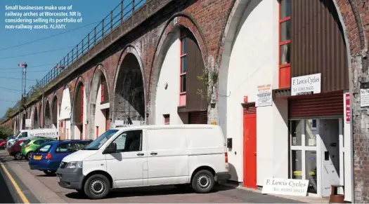  ?? ALAMY. ?? Small businesses make use of railway arches at Worcester. NR is considerin­g selling its portfolio of non-railway assets.