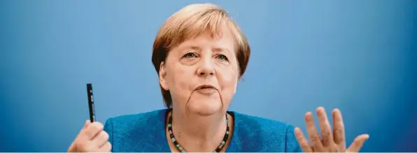  ?? Foto: Michael Kappeler, dpa ?? Es dürfte Merkels vorletzte Sommerpres­sekonferen­z gewesen sein – doch Zeit, um über ihren Ruhestand nachzudenk­en, bleibt Kanzlerin Angela Merkel noch nicht.