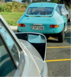  ??  ?? Left: The 1990 Nissan Autech Zagato Stelvio AZ1 bonkers wing shrouds contrast with the lovely Fulvia Zagato