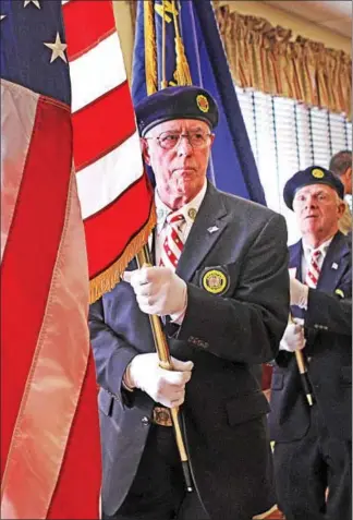  ?? CHRIS BARBER — DIGITAL FIRST MEDIA ?? U.S. Army veteran Robert Eastwood leads the color guard into the Kennett Senior Center on the occasion of the annual veterans luncheon.