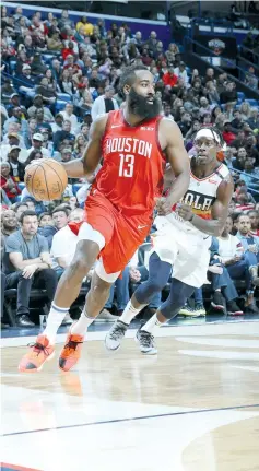  ?? — AFP photo ?? James Harden #13 of the Houston Rockets drives to the basket against the New Orleans Pelicans on December 29, 2018 at the Smoothie King Center in New Orleans, Louisiana.