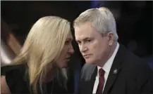  ?? AP file photo ?? Rep. Marjorie Taylor Greene, R-Ga., talks with Rep. James Comer, R-Ky., during opening day of the 118th Congress at the U.S. Capitol, Jan 3, 2023, in Washington.