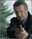  ??  ?? Bank robber Tom Carter (Liam Neeson) wants to go straight in “Honest Thief,” but the government just won’t work with the small businessma­n.