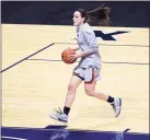  ?? Jessica Hill / Associated Press ?? UConn’s Nika Muhl warms up before a Big East tournament semifinal game at Mohegan Sun Arena in Uncasville on March 7.