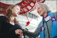  ?? (File Photo/AP/Jean-Francois Badias) ?? Swiss member of Senior Women for Climate Rosmarie Wydler-Walti (right) talks to Swedish climate activist Greta Thunberg on April 9 after the European Court of Human Rights’ ruling in Strasbourg, France. Europe’s highest human rights court ruled that its member nations have an obligation to protect their citizens from the ill effects of climate change but still threw out a highprofil­e case brought by six Portuguese youngsters aimed at forcing countries to reduce greenhouse gas emissions.