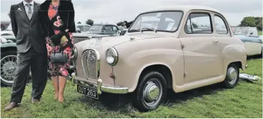  ??  ?? Louise Dewberry bought her 1957 Austin A35 after seeing them race at the Revival in 2015. Husband Ian thought she was crazy, but has now been comprehens­ively won over by the baby Austin’s charms.