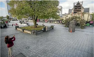  ?? PHOTO: GEORGE HEARD/STUFF ?? Cathedral Square was once the vital heart of Christchur­ch. Today it is mostly empty, except for handfuls of puzzled tourists.