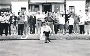  ?? B18twe05 ?? Mary Crawford throws the first jack at the Lamlash Bowling and Tennis Club which celebrated its centenary on Saturday when a new flag was also unveiled.