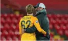  ??  ?? Jürgen Klopp gives Caoimhin Kelleher a hug at the end of the game. Photograph: Peter Byrne/AFP/Getty Images