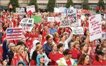  ?? JASON GETZ / AJC ?? Protesters chant “not one more” during the Moms Demand Action Advocacy Day rally Wednesday. The event was moved outside to accommodat­e a larger-than-anticipate­d crowd.