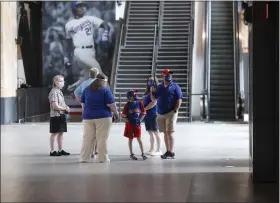  ?? LM OTERO — THE ASSOCIATED PRESS ?? Fans check out the concourse at Globe Life Field, the new home of the Texas Rangers, during the first day of public tours June 1in Arlington, Texas.