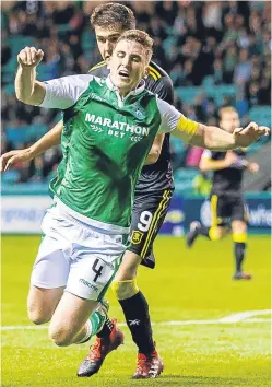  ??  ?? Paul Hanlon goes down for the penalty that decided the tie.