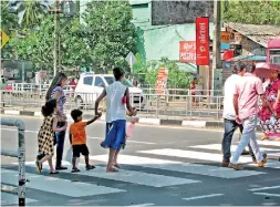  ??  ?? Family members make their way to the Kalutara Magistrate's court