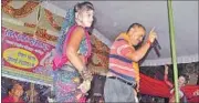  ?? HT PHOTOS ?? RPF sub inspector with women dancers at a function; and (right). the injured scribe at the district hospital.