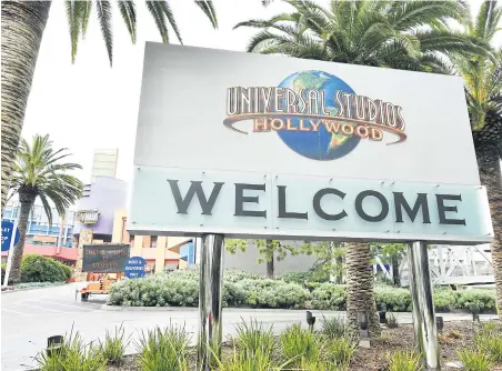  ?? GETTY IMAGES/AFP ?? Universal Studios Hollywood will remain closed at least through April 19.