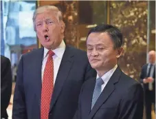  ?? TIMOTHY CARLY, AFP/GETTY IMAGES ?? President Trump with Alibaba Group’s Jack Ma, who plans a conference in June to boost American interests in China.