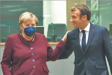  ?? TWITTER ?? SALUDO. Con el francés Emmanuel Macron, uno de sus últimos socios en las cuestiones de la Unión.