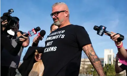  ?? Photograph: Sam Thomas/AP ?? The former Proud Boys organizer Joseph Biggs walks from the courthouse in Orlando, Florida, in January 2021, after a court hearing.