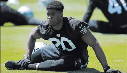  ?? Ben Margot ?? The Associated Press Raiders safety Obi Melifonwu, stretching during a June training session, finishes his rookie season playing 34 defensive snaps.