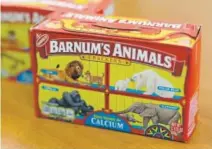  ?? Kiichiro Sato, The Associated Press ?? Instead of showing the animals in cages, implying that they’re traveling in boxcars for the circus, the new animal cracker boxes feature a zebra, elephant, lion, giraffe and gorilla side by side in a grassland.