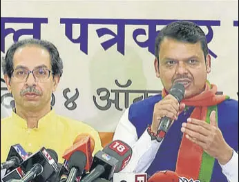  ?? ANI FILE ?? Shiv Sena chief Uddhav Thackeray (left) and Maharashtr­a chief minister Devendra Fadnavis at a press conference in Mumbai last week.
