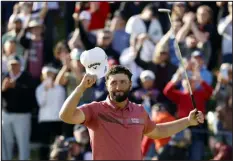  ?? RYAN KANG — THE ASSOCIATED PRESS ?? Jon Rahm celebrates on the 18th green after winning the Genesis Invitation­al at Riviera Country Club on Sunday in the Pacific Palisades area of Los Angeles.