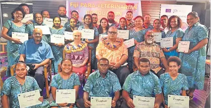  ?? Picture: MINISTRY OF AGRICULTUR­E AND WATERWAYS ?? Agricultur­e and Waterways Minister Vatimi Rayalu and Assistant Minister for Agricultur­e Tomasi Tunabuna with graduates after the certificat­e presentati­on.