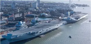  ?? ?? Response: HMS Queen Elizabeth, in front, with HMS Prince of Wales