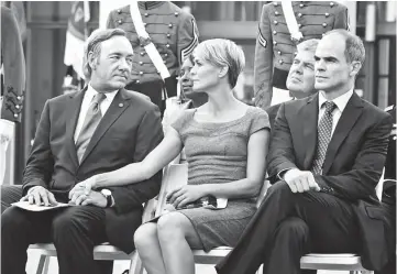  ??  ?? Spacey, Robin Wright and Michael Kelly in a scene from ‘House of Cards’. — Courtesy of Netflix