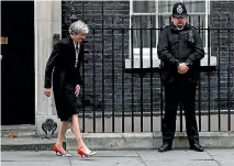  ?? PHOTO: REUTERS ?? Britain’s Prime Minister Theresa May outside Number 10 Downing Street in London.