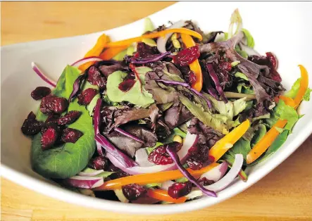  ?? PHOTOS: ATCO BLUE FLAME KITCHEN ?? A tangy cranberry vinaigrett­e adds some sweetness to this crunchy, hearty winter salad.