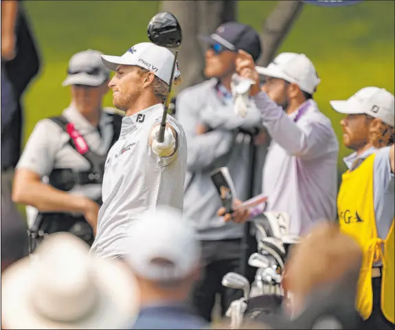  ?? Matt York The Associated Press ?? Will Zalatoris watches his tee shot on the 12th hole sail left during the final round of the PGA Championsh­ip. Zalatoris lost a playoff by a shot to Justin Thomas.