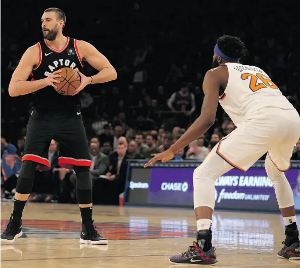  ?? BRAD PENNER/USA TODAY SPORTS ?? Marc Gasol made his debut in a Toronto Raptors jersey Saturday night at Madison Square Garden against Mitchell Robinson and the New York Knicks. Gasol came off the bench in the 104-99 win, but don’t expect the centre to remain on the second unit all season.