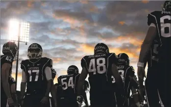  ?? Jessica Hill / Associated Press ?? Connecticu­t players take the field before an NCAA college football game against Maryland at Rentschler Field in East Hartford on Sept. 14, 2013.