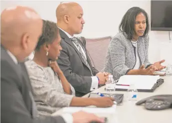  ?? | ASHLEE REZIN/ SUN- TIMES ?? Ald. Sophia King ( 4th, right) and three of her challenger­s in Tuesday’s 4thWard special aldermanic election ( from left), Gerald Scott McCarthy, Ebony Lucas and Marcellus Moore Jr.