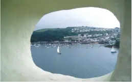  ??  ?? West Country bolt hole: Polruan spied from Fowey on a grey day