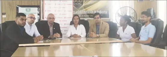  ??  ?? From left are Executive Director of the Georgetown Chamber of Commerce and Industry (GCCI) Richard Rambarran, VicePresid­ent of the GCCI Nicholas Boyer; ActionCOAC­H Guyana head and member of GCCI Vishnu Doerga, Scotiabank’s Marketing Manager Jennifer...