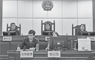  ?? MAO SIQIAN / XINHUA ?? The Supreme People’s Court’s No 1 circuit court hears the first case in Shenzhen, Guangdong province, on March 2
after it started operations in February.