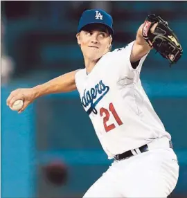  ?? ZACK GREINKE
Stephen Dunn Getty Images ?? is pitching for the Dodgers at Minnesota on Wednesday but probably won’t throw on short rest at Miami on Sunday.