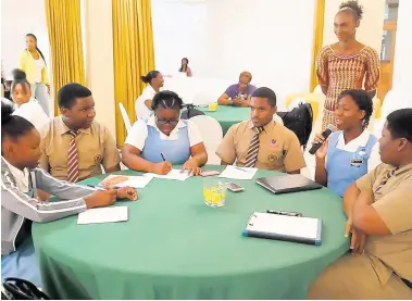  ??  ?? Ardenne students engaging in an active discussion with host Leneka Rhoden.