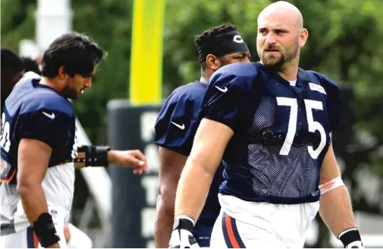  ?? | ELISE AMENDOLA/ AP ?? Bears right guard Kyle Long’s injured right ankle was far more serious than his shoulder problem. He had major surgery in December to repair it.