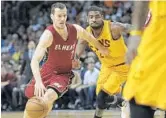  ?? MICHAEL LAUGHLIN/STAFF FILE PHOTO ?? Goran Dragic, left, despite his work with the Heat, Ira Winderman says the team would be better with Kyrie Irving, right, on it.