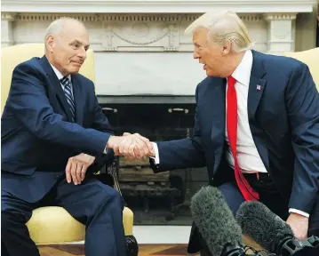  ?? EVAN VUCCI/THE ASSOCIATED PRESS ?? U.S. President Donald Trump meets with new White House Chief of Staff John Kelly after he was sworn in at the Oval Office on Monday. Kelly has been tasked with saving the White House from itself, Matthew Fisher writes.