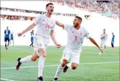  ?? AFP ?? Spain’s defender Aymeric Laporte (left) celebrates after scoring his team’s second goal with midfielder Koke during the UEFA EURO 2020 Group E football match against Slovakia on June 23.