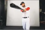  ?? Gerald Herbert / Associated Press ?? Boston Red Sox second baseman Dustin Pedroia sets up for a portrait during media day at their spring training baseball facility in Ft. Myers, Fla., on Tuesday.